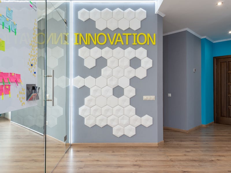 Modern commercial office renovation with a feature wall and glass partition