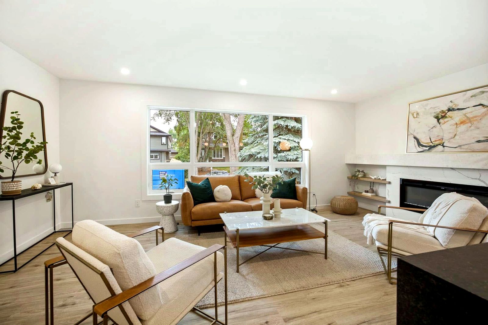 Renovated open-concept living space with modern finishes in a Sherwood Park area home